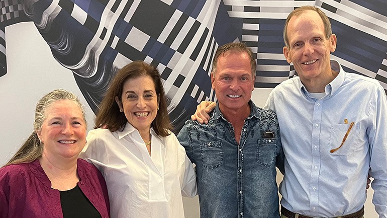 Pictured before BMI songwriter Tim James hits the stage at the 2023 Marriott Attorney Summit (L to R): Marriott General Counsel Rena Reiss, Marriott Intellectual Property VP & Senior Counsel Elisabeth Escobar, BMI songwriter Tim James, BMI’s Dan Spears.