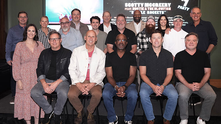 Photo Back Row L-R: BMI’s Todd Horvath, BMI’s Leslie Roberts, Derek George (ASCAP), BMI’s Mason Hunter, Bobby Hamrick (ASCAP), BMI’s Clay Bradley, Jeremy Bussey (SESAC), BMI’s Shannon Sanders, Brent Anderson (SESAC), BMI’s Claire Dodelin, Monty Criswell (BMI), BMI’s Mike O’Neill; Front Row L-R: BMI’s MaryAnn Keen, Hootie & The Blowfish’s Dean Felber (ASCAP), Jim Sonfeld (ASCAP) and Darius Rucker (ASCAP), Scotty McCreery (BMI), Frank Rogers (ASCAP/Producer).