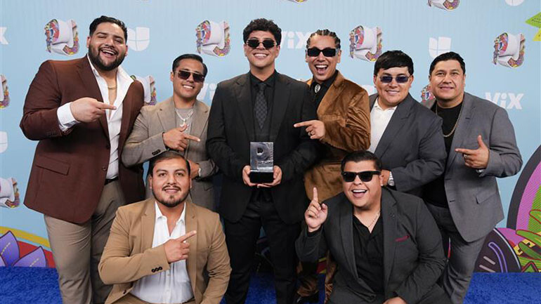 Grupo Firme with the Best Mexican Banda Music award.