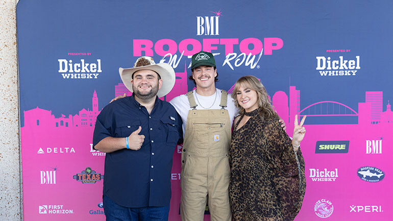 Photo L-R: Love On The Spectrum’s Tyler White (BMI), Zach John King (BMI) and Aniston Pate (BMI) kick off the eighth season of BMI’s Rooftop On The Row® in Nashville.