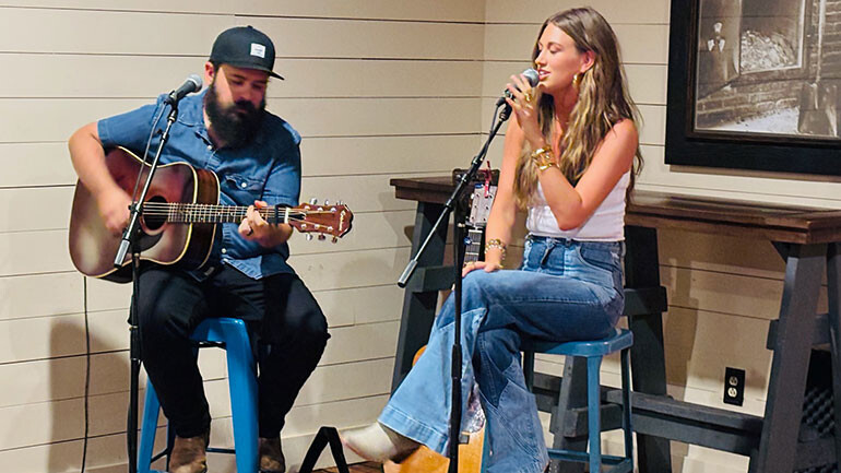 BMI singer/songwriter & Big Loud recording artist Lauren Watkins and guitarist Damon Atkins perform at the Rising Through the Ranks Dinner at Martin’s BBQ Downtown.