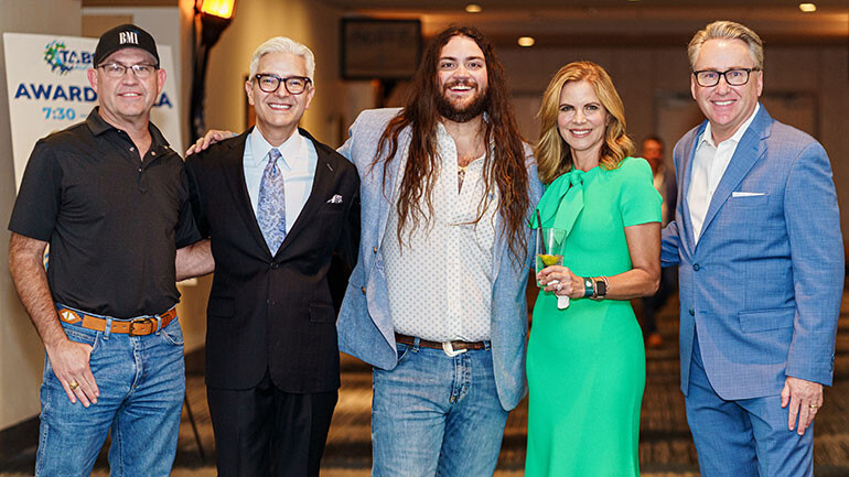 Pictured before BMI singer/songwriter Race Ricketts took the stage at the 2025 Texas Association of Broadcasters Annual Awards Gala (L to R): BMI’s Mitch Ballard, Texas Association of Broadcasters President Oscar Rodriguez, BMI Singer-Songwriter Race Ricketts, CBS News Correspondent & 48 HOURS contributor Natalie Morales and TAB Board Member & CBS News Venture Senior Vice President Southwest Kevin Frady.