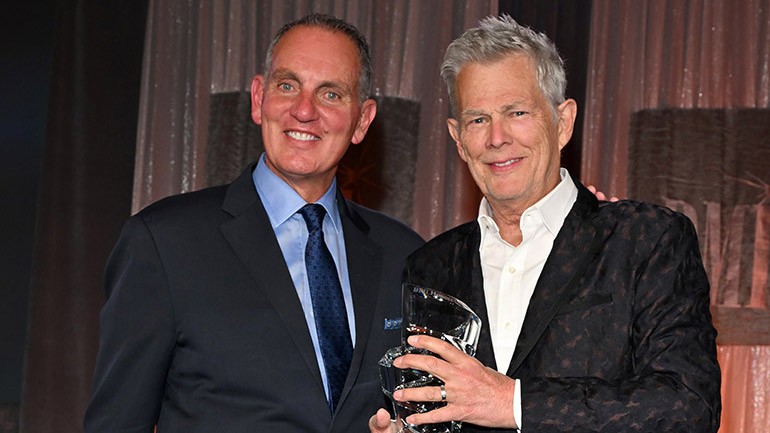 BMI’s President & CEO Mike O’Neill honors David Foster onstage at the 74th Annual BMI/NAB Dinner at Encore Las Vegas on April 16, 2024.