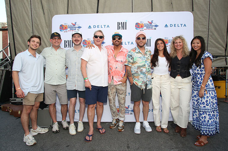 Photo L-R: BMI’s Jackson Kiger, BMI’s Mitch Ballard, BMI’s Josh Tomlinson, BMI’s Clay Bradley, LOCASH, BMI’s Kelsey O’Neill, BMI’s Nina Carter and BMI’s Lilly Brown pose backstage at the Duval Street show during the 29th annual Key West Songwriters Festival.