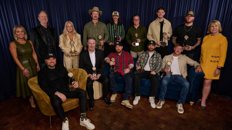 (Top Row L-R) CMA’s Tiffany Kerns, Host Jim Beavers, Jessie Jo Dillon (BMI), Chase McGill (BMI), John Morgan (BMI), Andy Albert (ASCAP), Blake Pendergrass (BMI), Taylor Phillips (BMI), CMA’s Sarah Trahern, (Bottom Row L-R) Jacob Kasher Hindlin (ASCAP), NSAI’s Bart Herbison, Charlie Handsome (BMI), John Byron (BMI) and Ashley Gorley (ASCAP) at the 2026 CMA Triple Play Awards.
